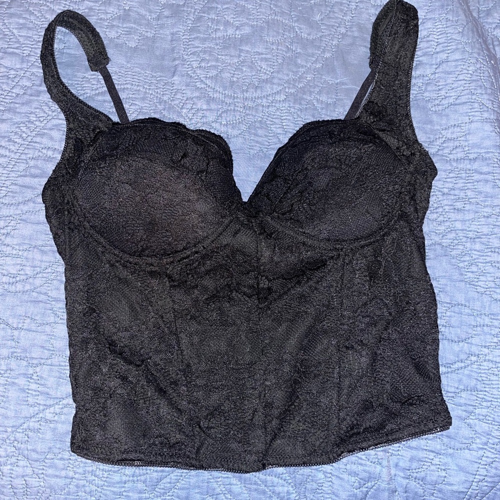 Black corset like top, size large and from the brand reoria.